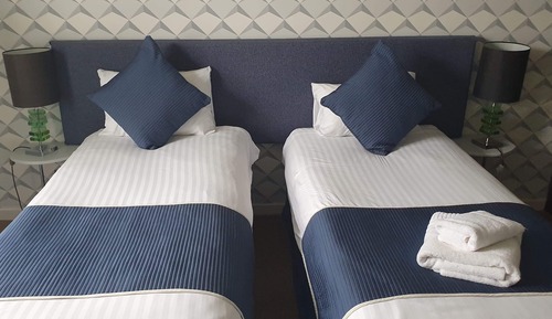 Habitación Club con 2 camas individuales