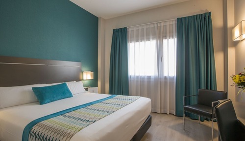 Habitación estándar con 1 cama doble o 2 individuales