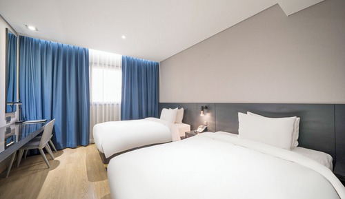 Habitación familiar con 2 camas individuales