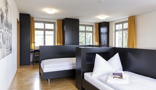 Habitación cuádruple, varias camas, baño compartido