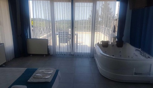 Habitación Deluxe, 1 cama de matrimonio, bañera de hidromasaje