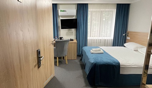 Habitación Confort con 1 cama doble o 2 individuales