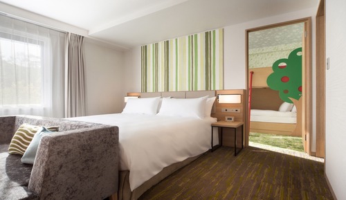 Habitación Premium, varias camas