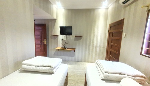 Habitación estándar con 1 cama doble o 2 individuales