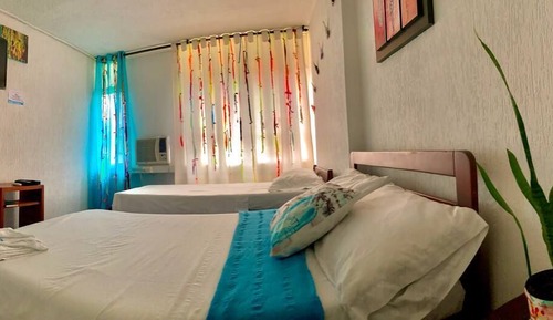 Habitación económica con 1 cama doble o 2 individuales, varias camas