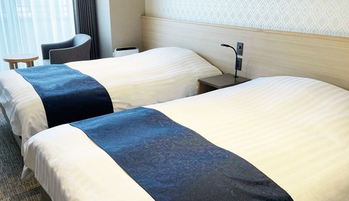 Habitación con 2 camas individuales