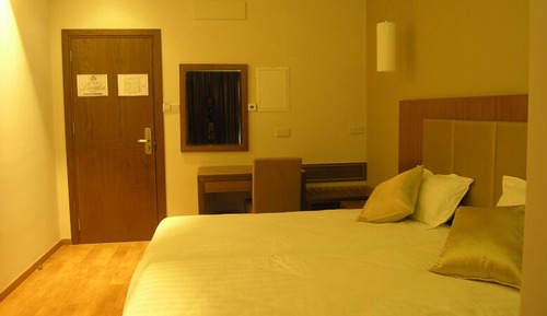 Habitación estándar con 1 cama doble o 2 individuales