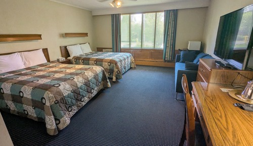 Habitación familiar, varias camas, vistas al jardín