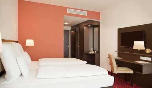 Habitación Confort con 1 cama doble o 2 individuales