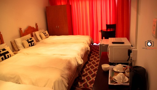 Habitación familiar, varias camas