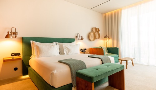 Habitación superior con 1 cama doble o 2 individuales (Plus)