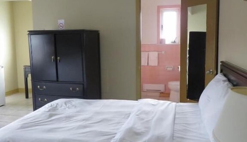 Habitación triple, varias camas