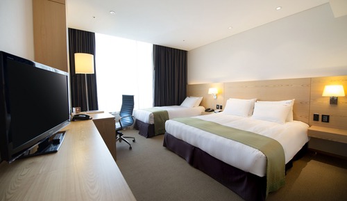 Habitación Premium, varias camas