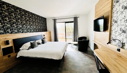 Habitación Deluxe con 1 cama doble o 2 individuales, baño privado