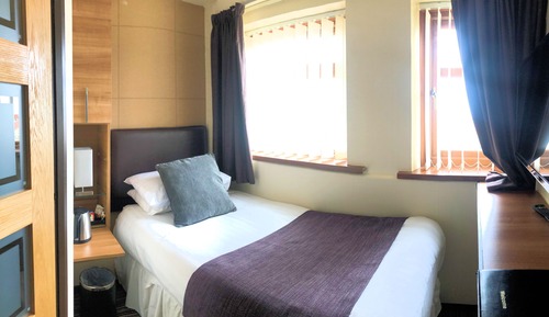 Habitación individual junior, baño privado