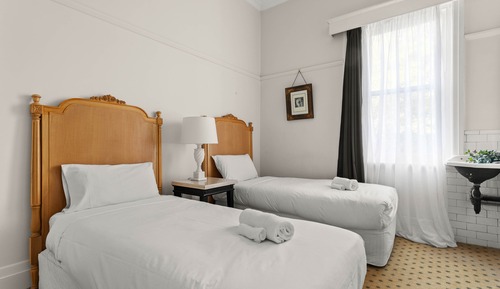 Habitación estándar con 2 camas individuales, 2 camas individuales, baño compartido