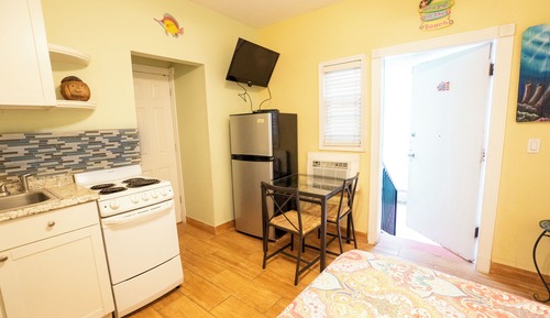 #1 = Sand and Sun = efficiency with a queen sized Bed