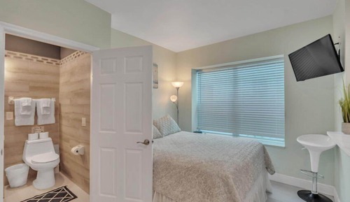 #4 = Seahorse Hideaway = 1 bedroom w/ queen sized bed and a futon couch