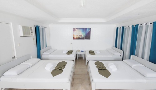 Habitación familiar, varias camas