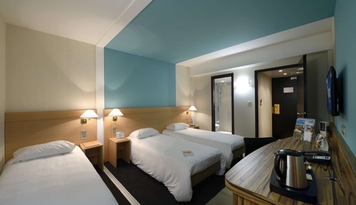 Habitación superior, varias camas