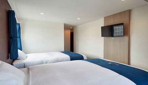 Habitación con 2 camas individuales