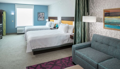 Estudio, 2 camas de matrimonio, vistas a la ciudad, en esquina