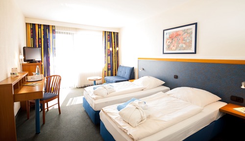 Habitación Confort con 1 cama doble o 2 individuales