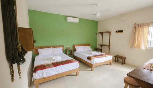 Habitación superior, varias camas, cocina básica