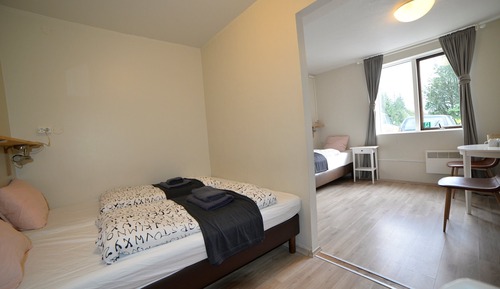 Habitación triple, baño compartido