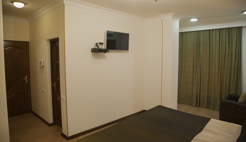 Habitación triple Premium, varias camas