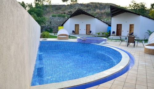 Habitación (Pool side Patang cottage with open)