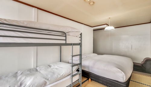 Habitación triple, baño compartido