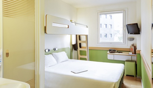 Habitación triple, varias camas