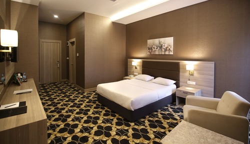 Habitación estándar con 1 cama doble o 2 individuales