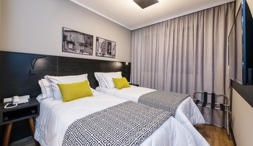 Habitación Business triple, 1 cama de matrimonio con sofá cama