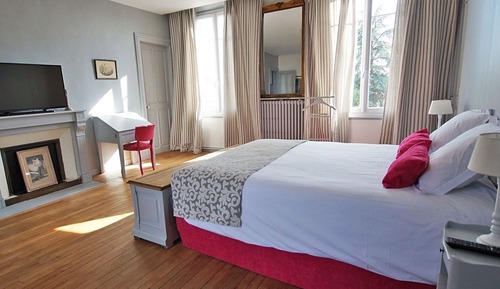 Suite superior, baño privado, vistas al jardín