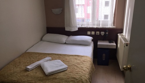 Habitación estándar con 1 cama doble o 2 individuales