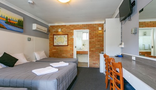 Habitación triple Deluxe, varias camas