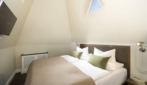 Suite, en una planta alta