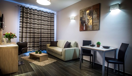 Habitación superior, 1 cama de matrimonio grande con sofá cama