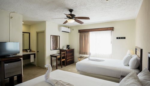 Habitación Clásica con Dos Camas Dobles