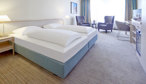 Habitación superior con 1 cama doble o 2 individuales