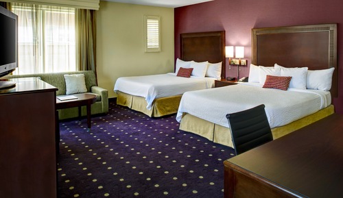 Habitación, varias camas, en esquina