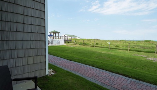 Habitación estándar, 1 cama de matrimonio grande con sofá cama, patio, planta baja