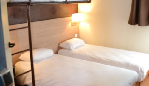 Habitación triple, varias camas