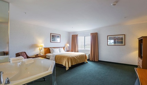 Suite, 1 cama de matrimonio grande, no fumadores, bañera de hidromasaje (Ground Floor)