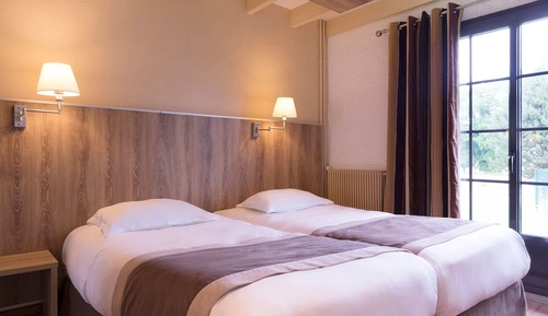 Habitación Confort con 1 cama doble o 2 individuales