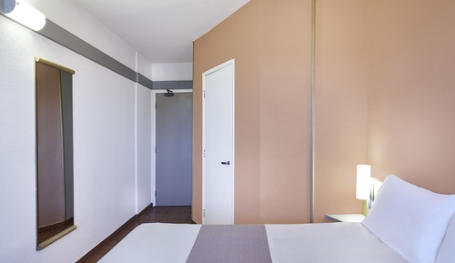 Habitación, varias camas