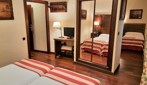 Habitación cuádruple familiar, varias camas