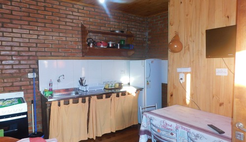 Habitación cuádruple, varias camas, cocina, vistas al jardín